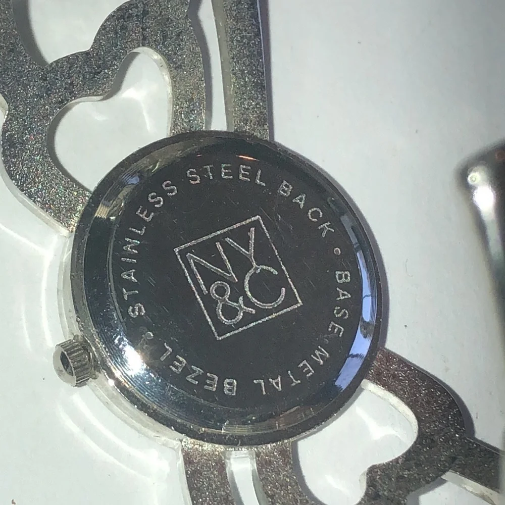 NY & Co. Silver Tone Cutout Cuff Band Watch Wristwatch NEW BATTERY